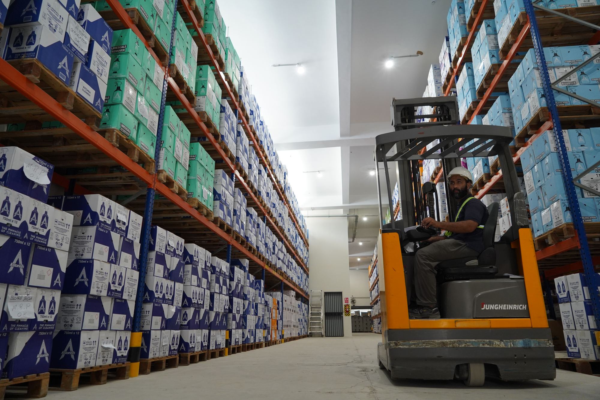 Reach truck moving Astonish stock at the KCIP warehouse
